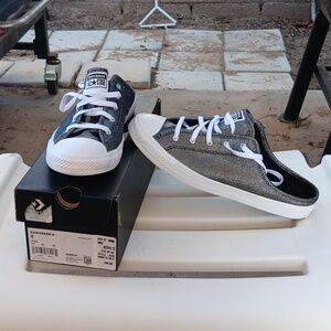 Women's converse slip ons. New in box size 8.